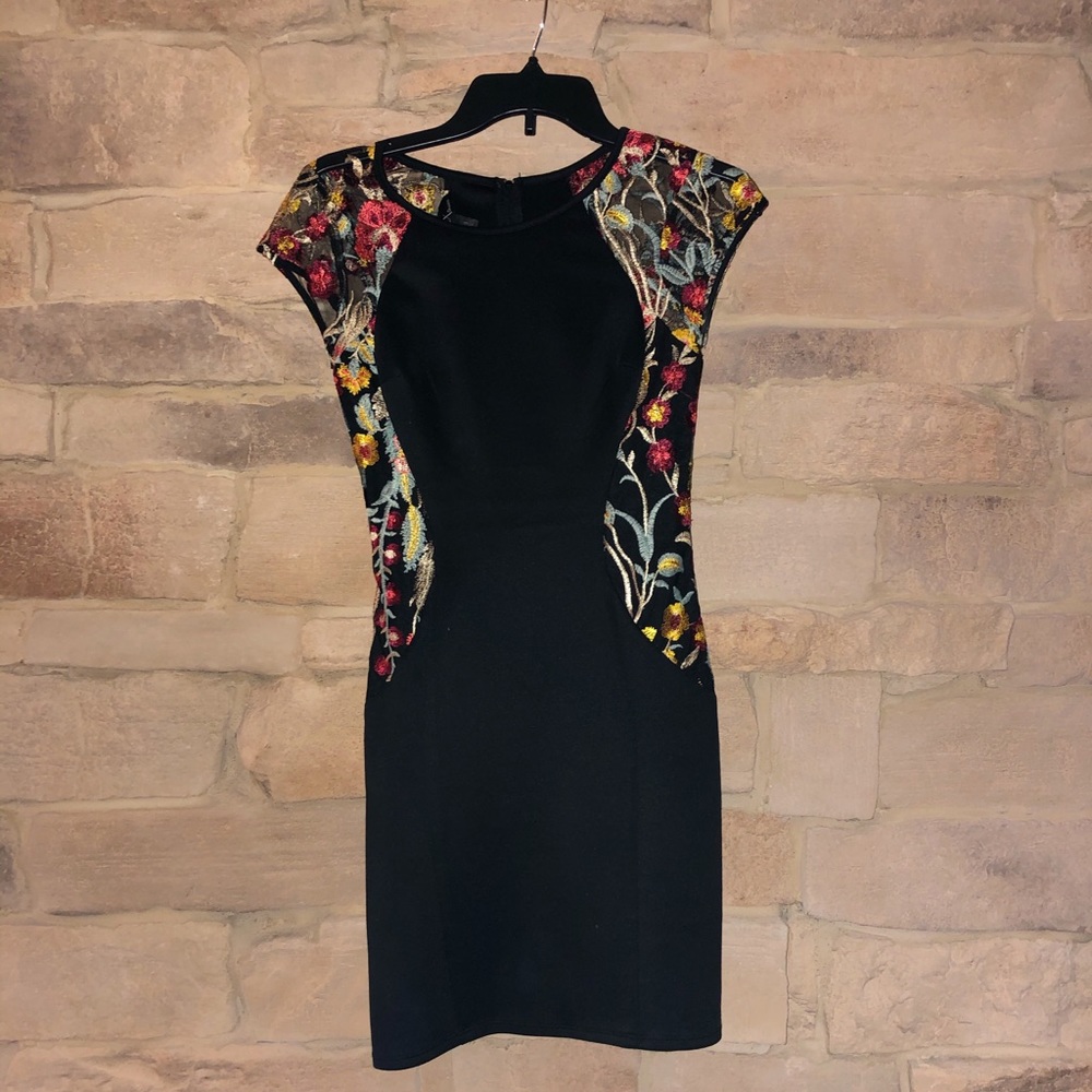 Black body con dress with sheer sides